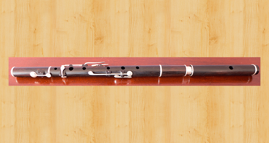 A Martin Doyle left handed six key flute made from Brazilian Rosewood.
