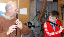 Martin Doyle plays a tune with young Barry Conaty.