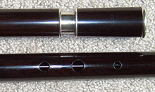 A thin-walled sterling silver tuning slide set in a Martin Doyle traditional style flute made from African blackwood.