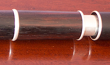 A thin-walled sterling silver tuning slide set in a Martin Doyle traditional style left-handed six key flute made from Rosewood.