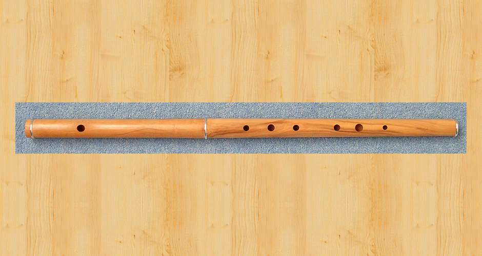 A Martin Doyle Traditional D flute made from boxwood with three sterling silver ferrules.