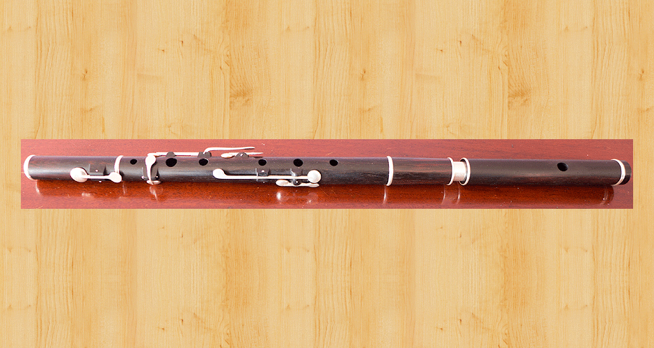 A stirling silver thin-walled tuning slide set in a Martin Doyle Traditional style keyed D flute made from Brazilian Rosekwood.